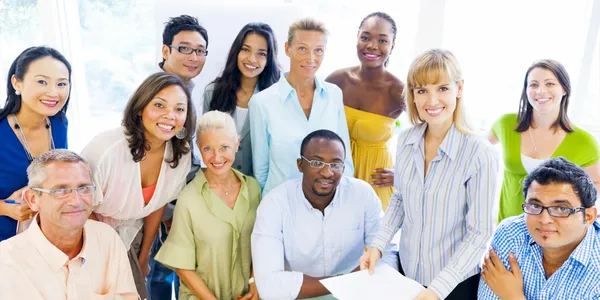 A group of people are posing for a picture together.