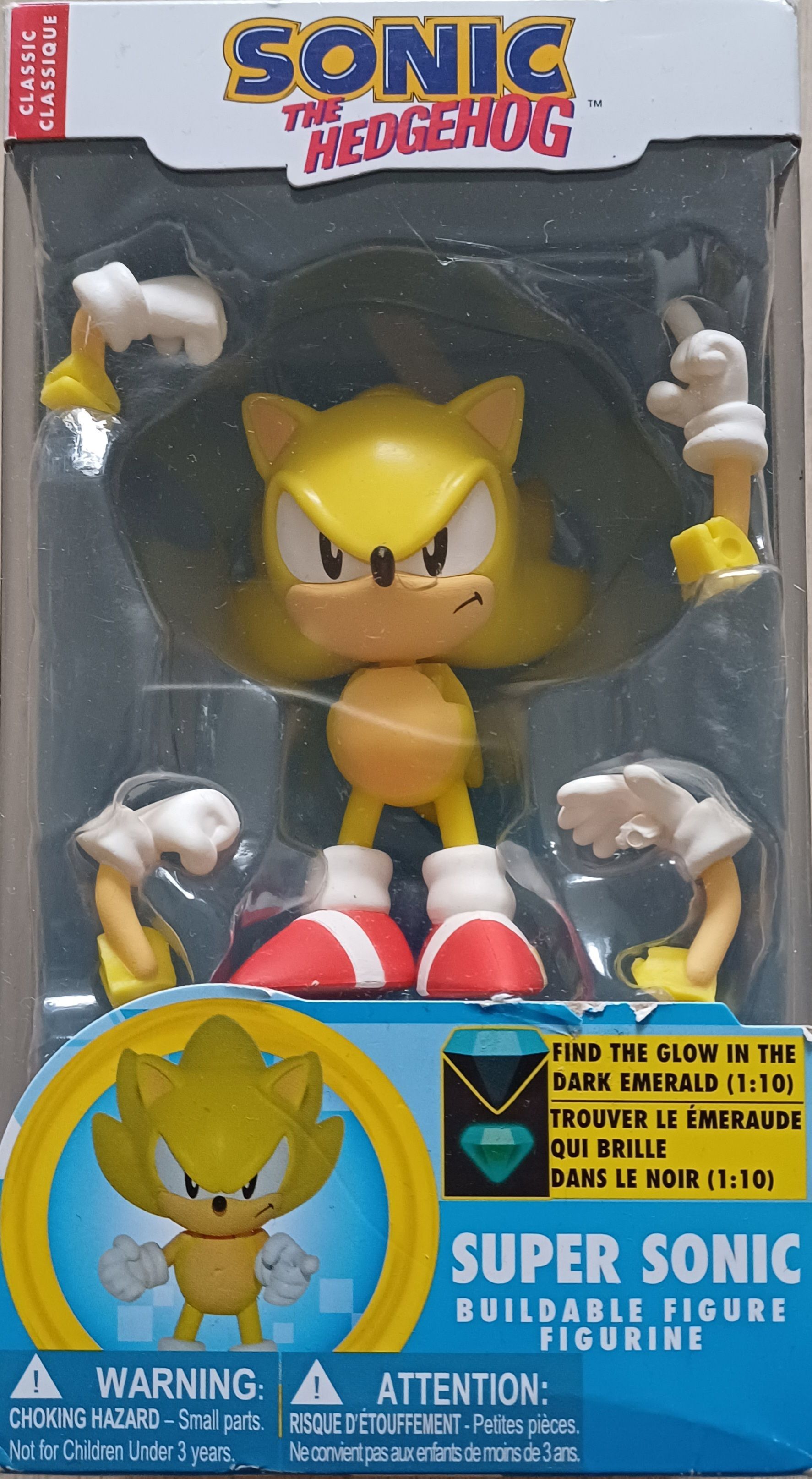 Super Sonic actiefiguur in verpakking. Gele egelfiguur met extra ledematen en edelsteen.