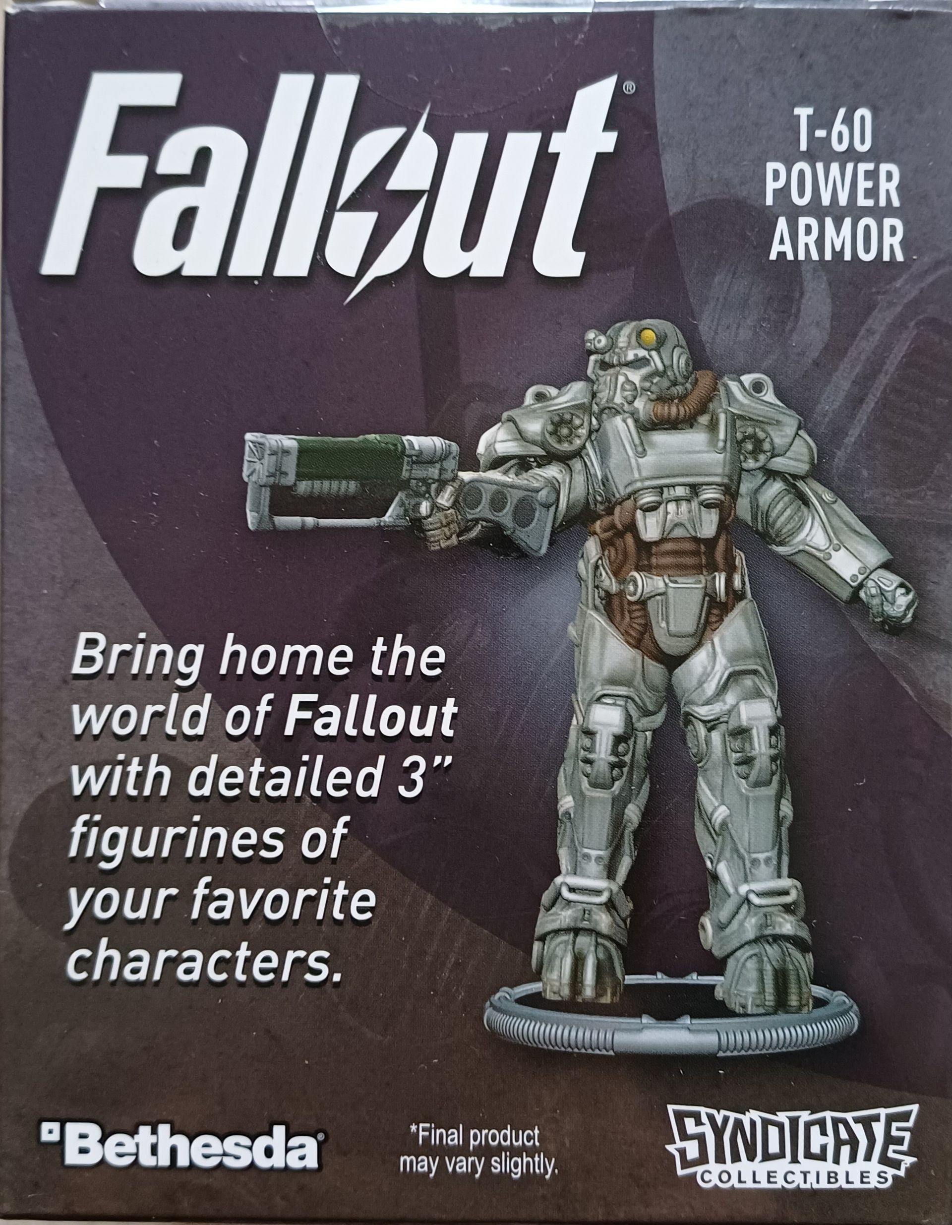 Doos met Fallout T-60 Power Armor-figuurtje. Grijs power armor-figuurtje met een wapen.