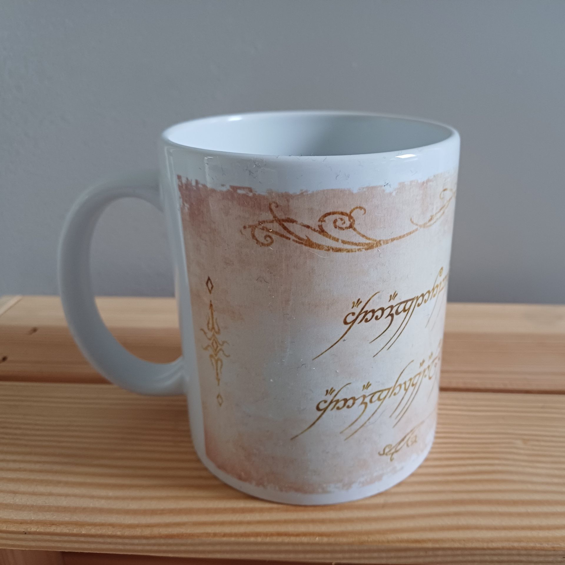 Witte koffiemok met de tekst 