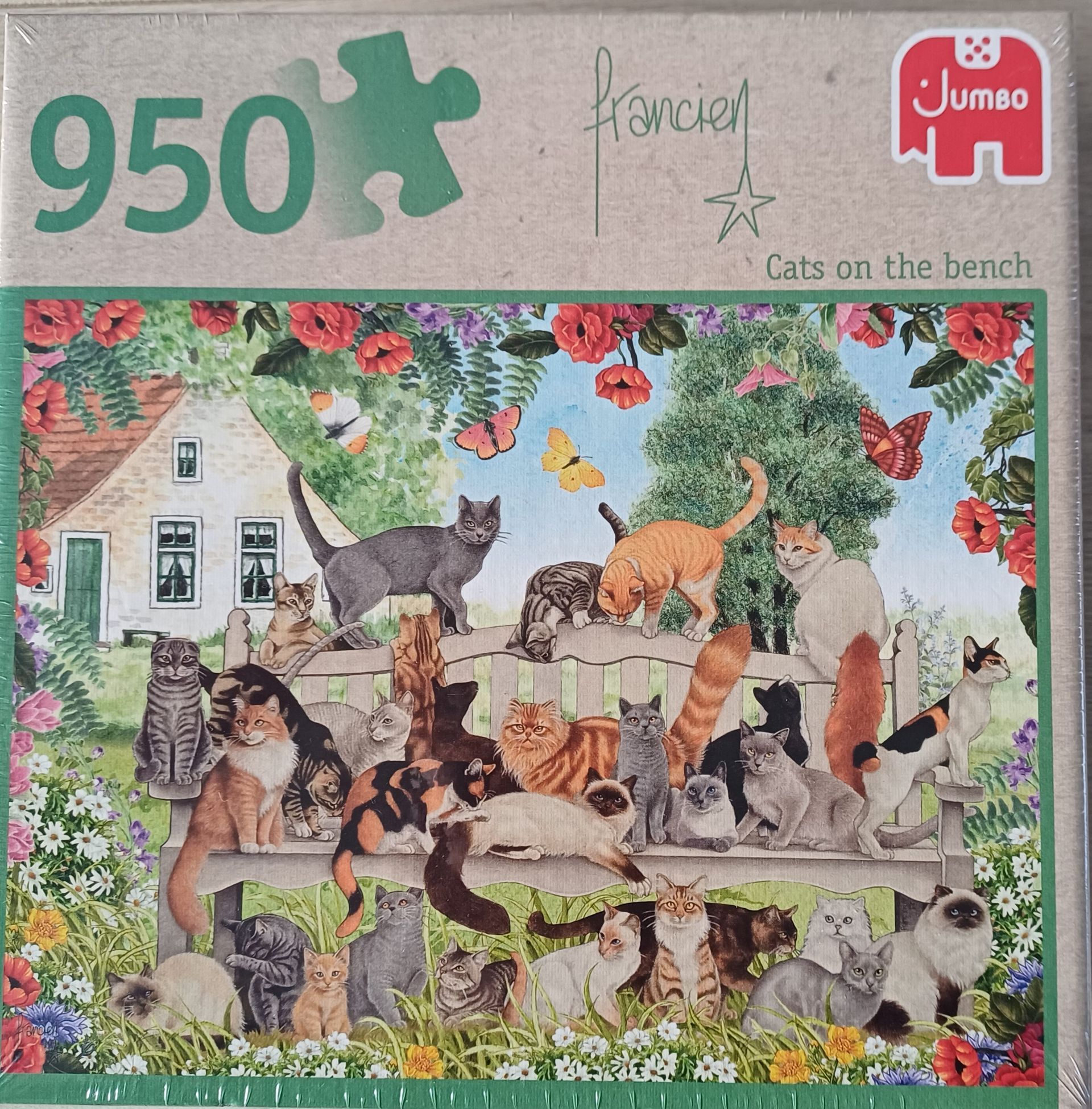 Puzzeldoos met 950 stukjes, waarop veel katten te zien zijn op een bankje voor een huis.