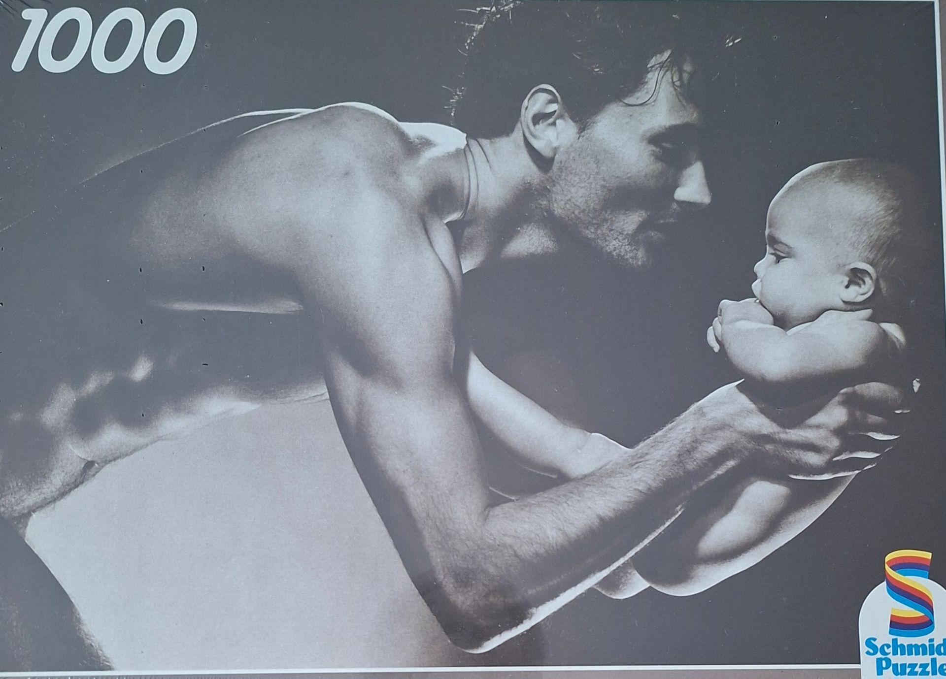 Schmidt zwart-wit legpuzzel: vader met baby - 1000 stukjes