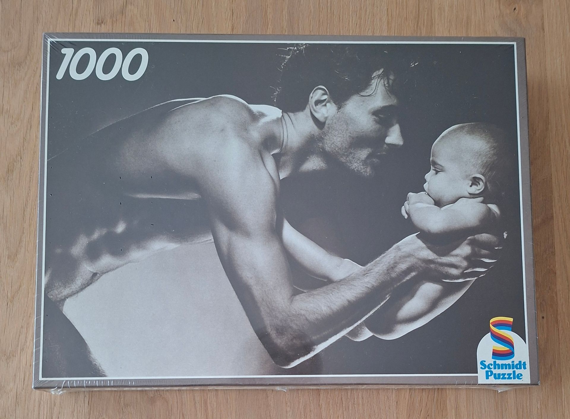 Schmidt zwart-wit legpuzzel: vader met baby - 1000 stukjes