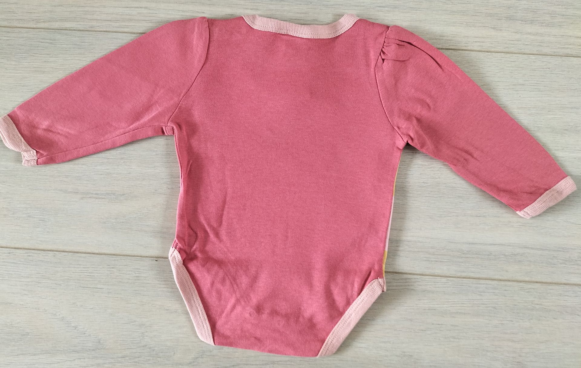 Roze Disney Winnie de Pooh romper. Maat 62 -68.