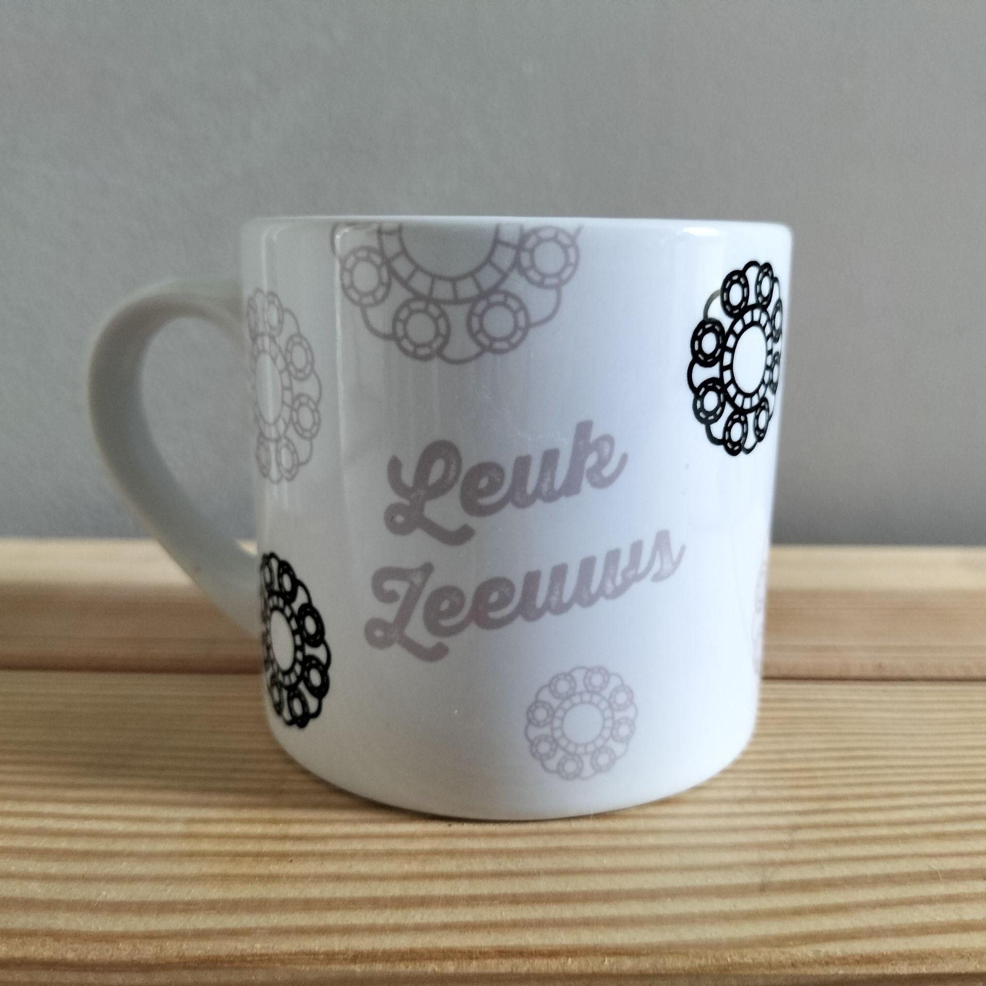 Witte mok met de tekst 