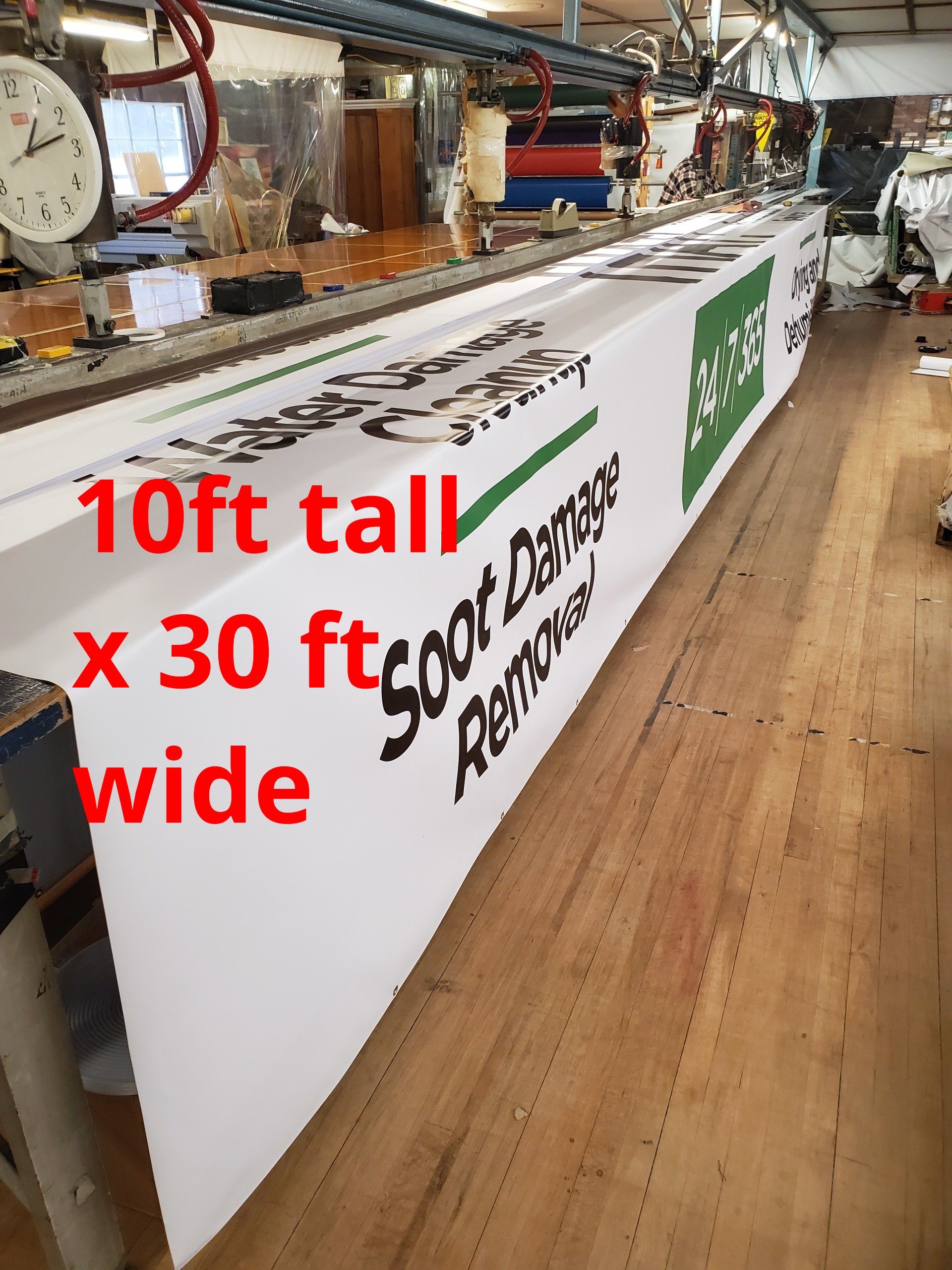 A sign that is 10 ft tall and 30 ft wide