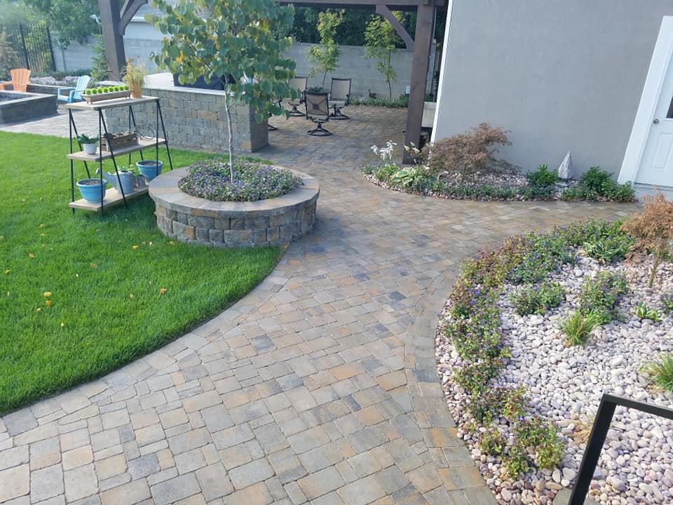 Curved paver garden walkway.