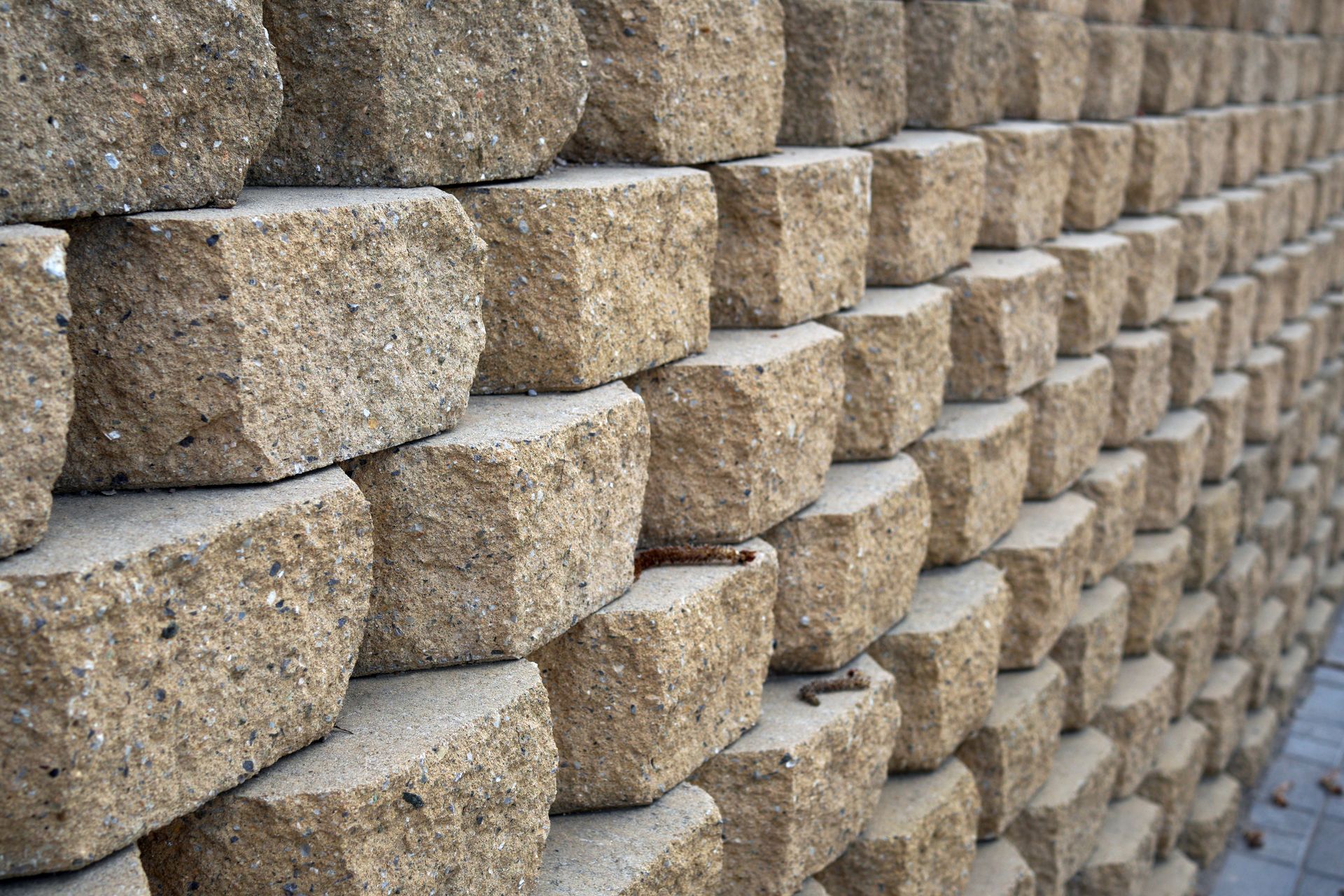 Close-up view of a modular concrete block retaining wall.