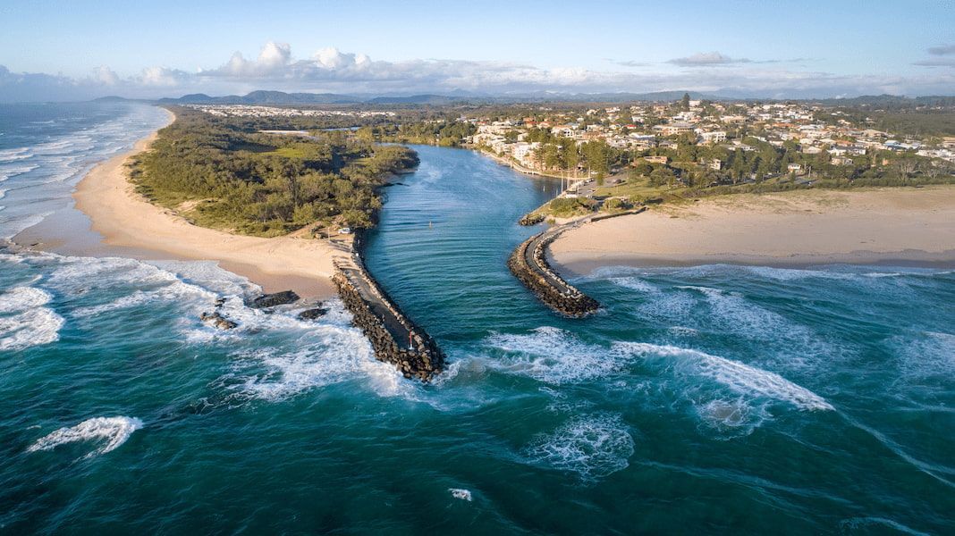 An Aerial View of A Beach and A River — Murwillumbah District Plumbing Service in Kingscliff, NSW