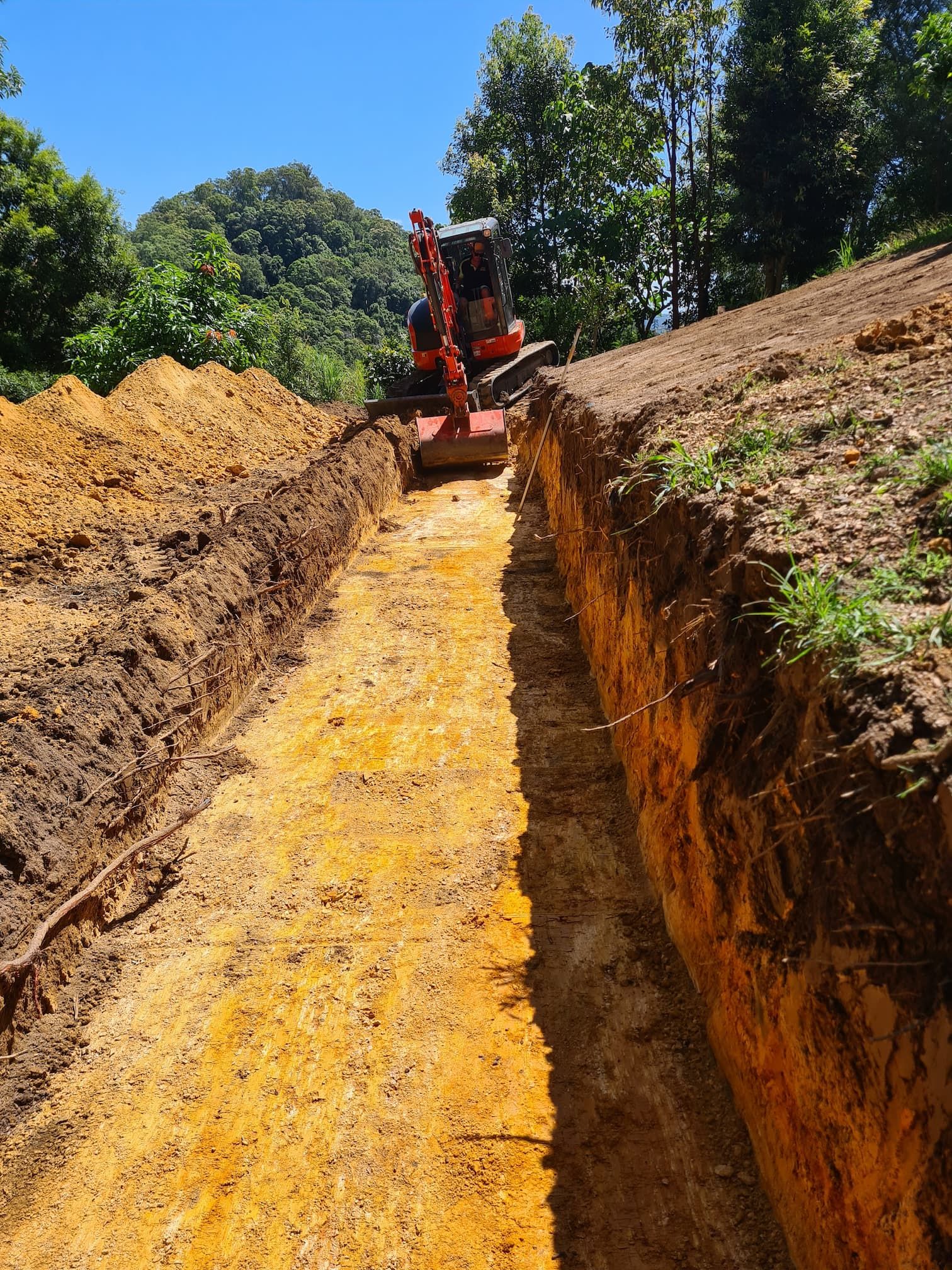 A Septic System Is Being Installed in A Dirt Field — Murwillumbah District Plumbing Service in Nunderi, NSW