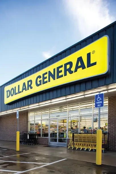 A dollar general store with a yellow sign above the door