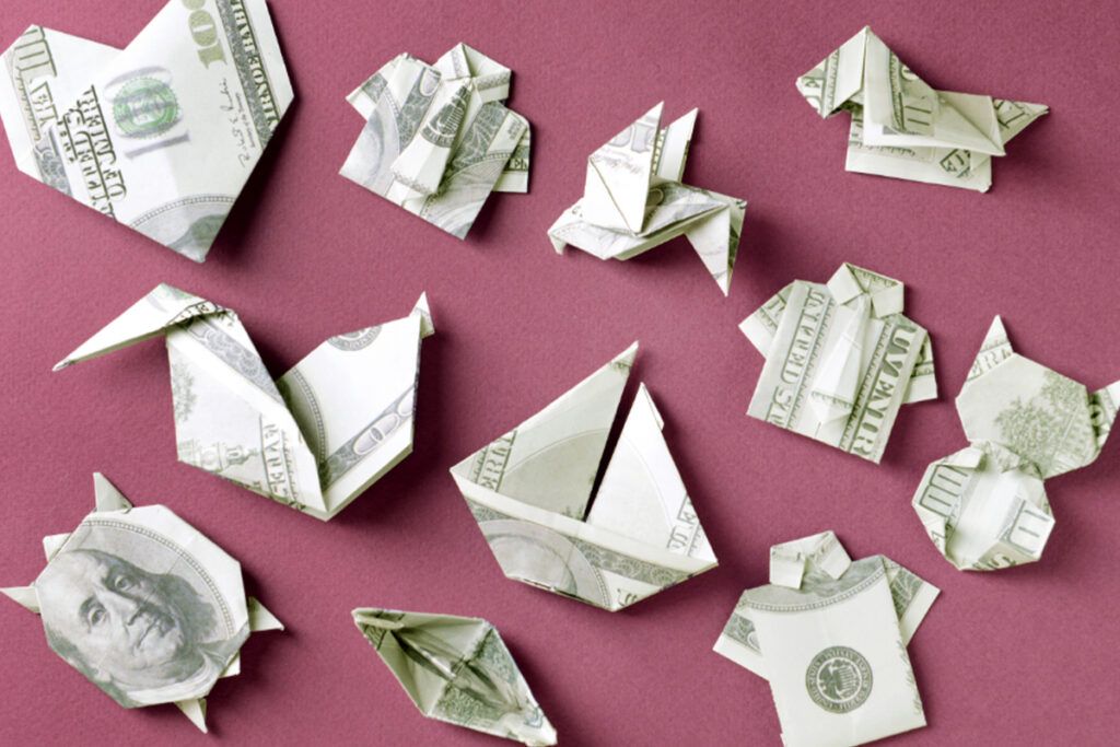 A heart made out of a 100 dollar bill