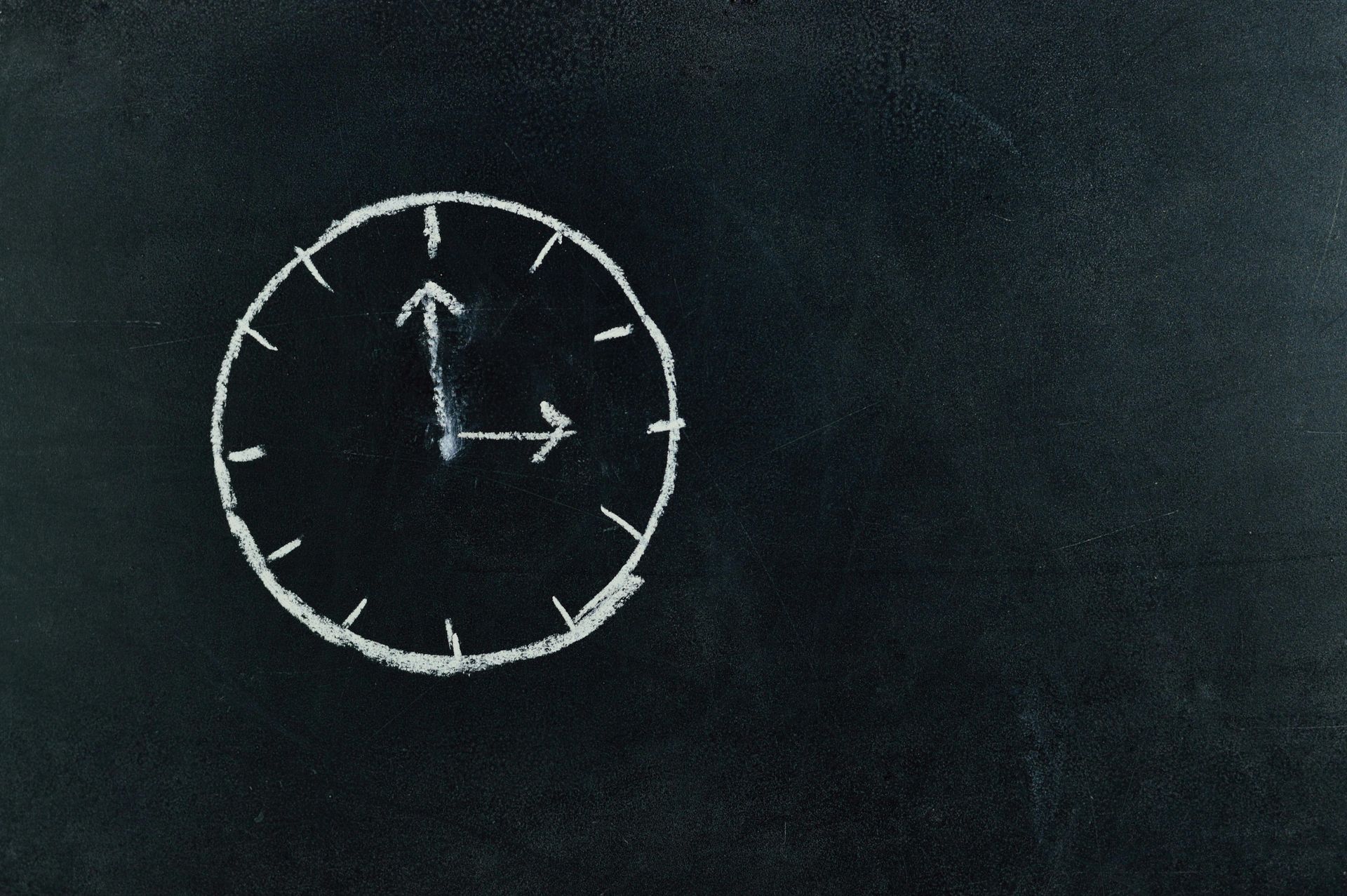 A chalk drawing of a clock representing patent term length