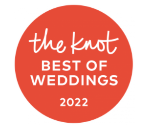 Red circular badge reading “the knot Best of Weddings 2022” in white text