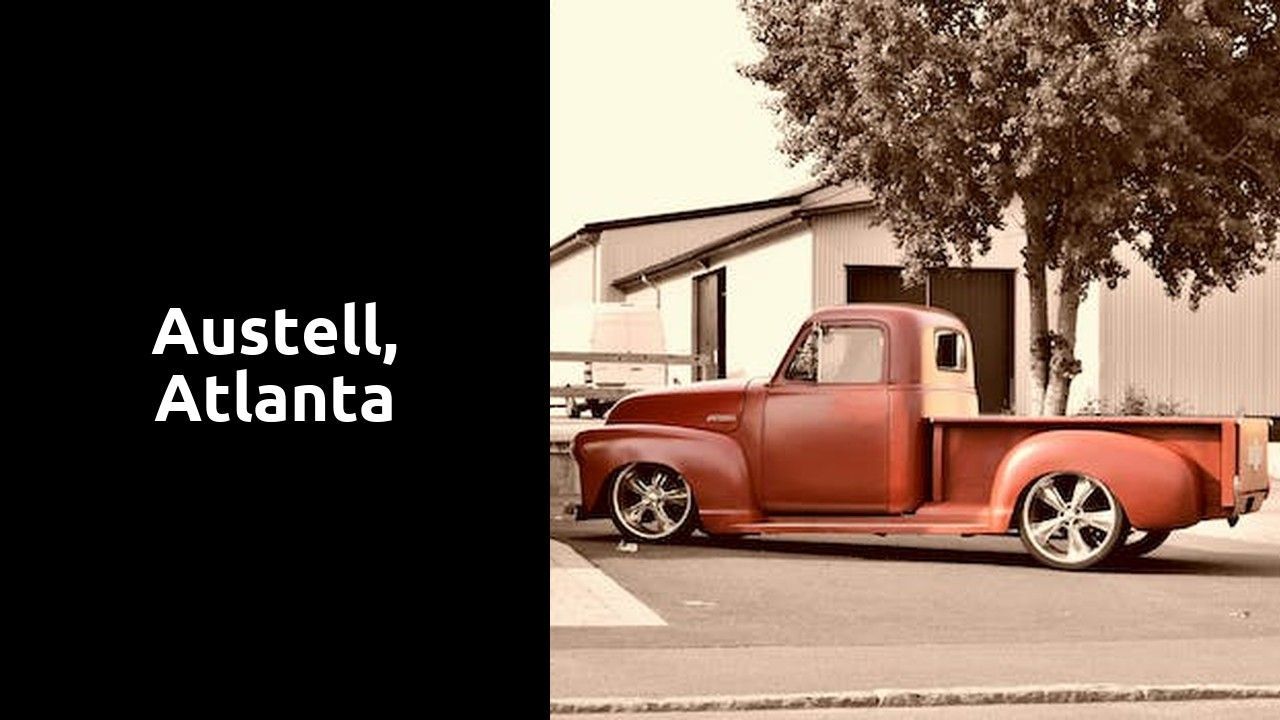 A red truck is parked on the road.