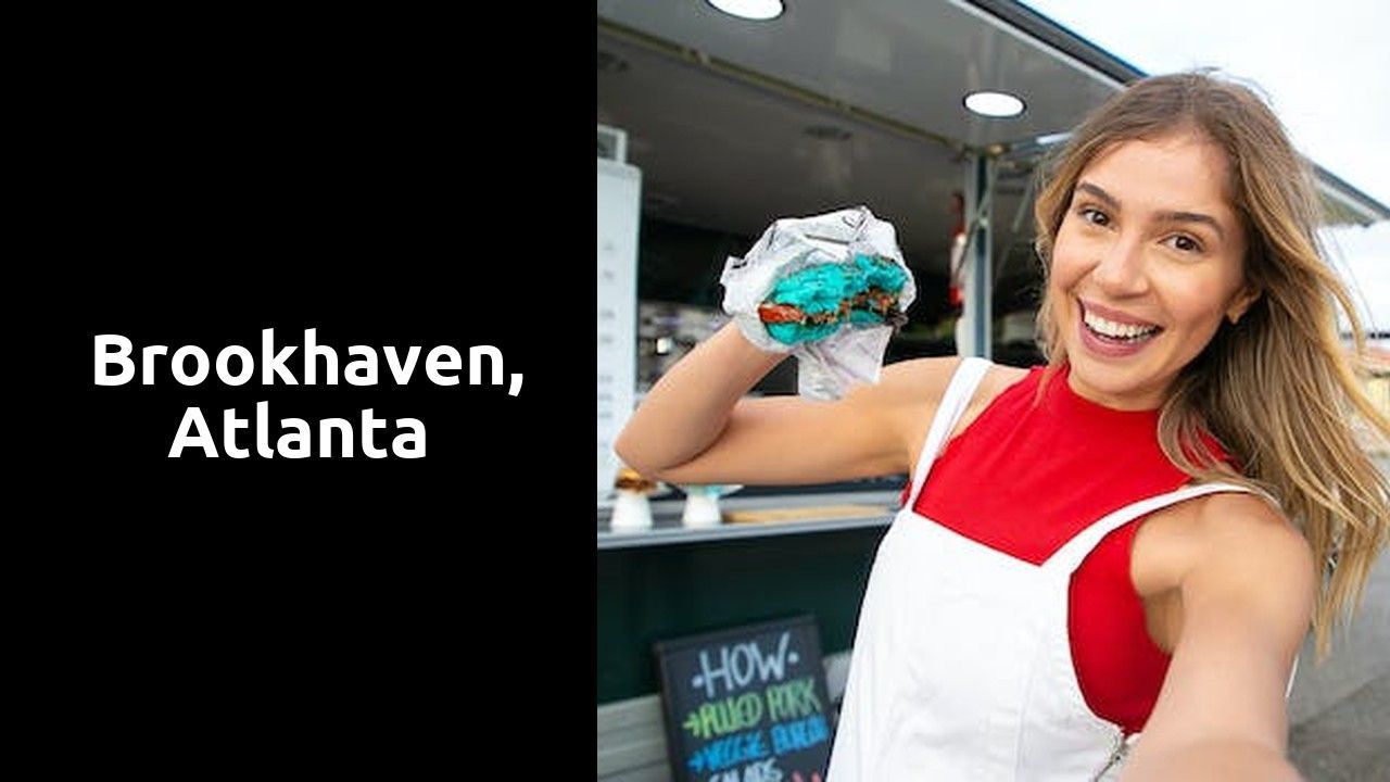 A woman is holding a burger in front of a food truck.