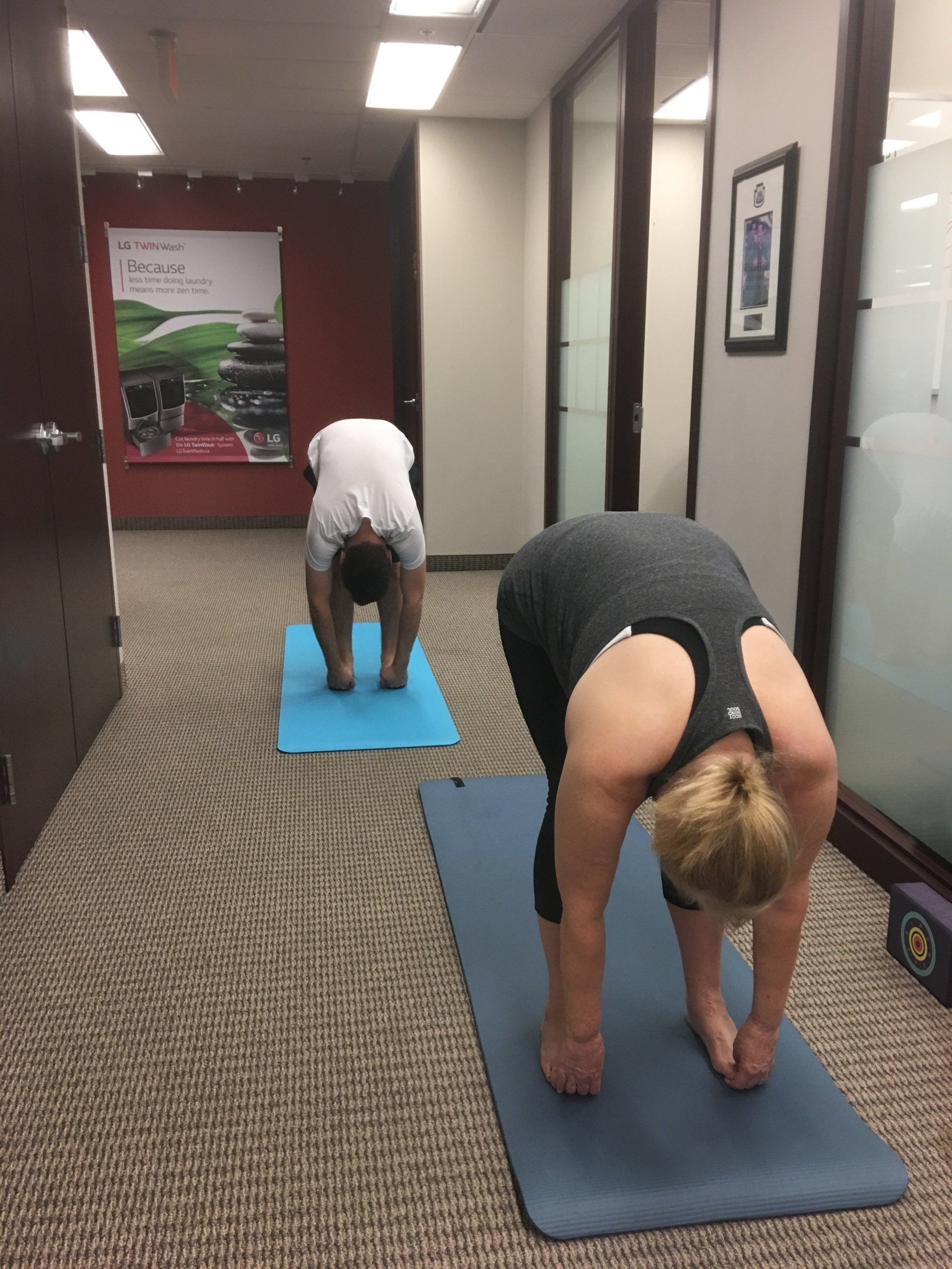 group of people with yoga mats
