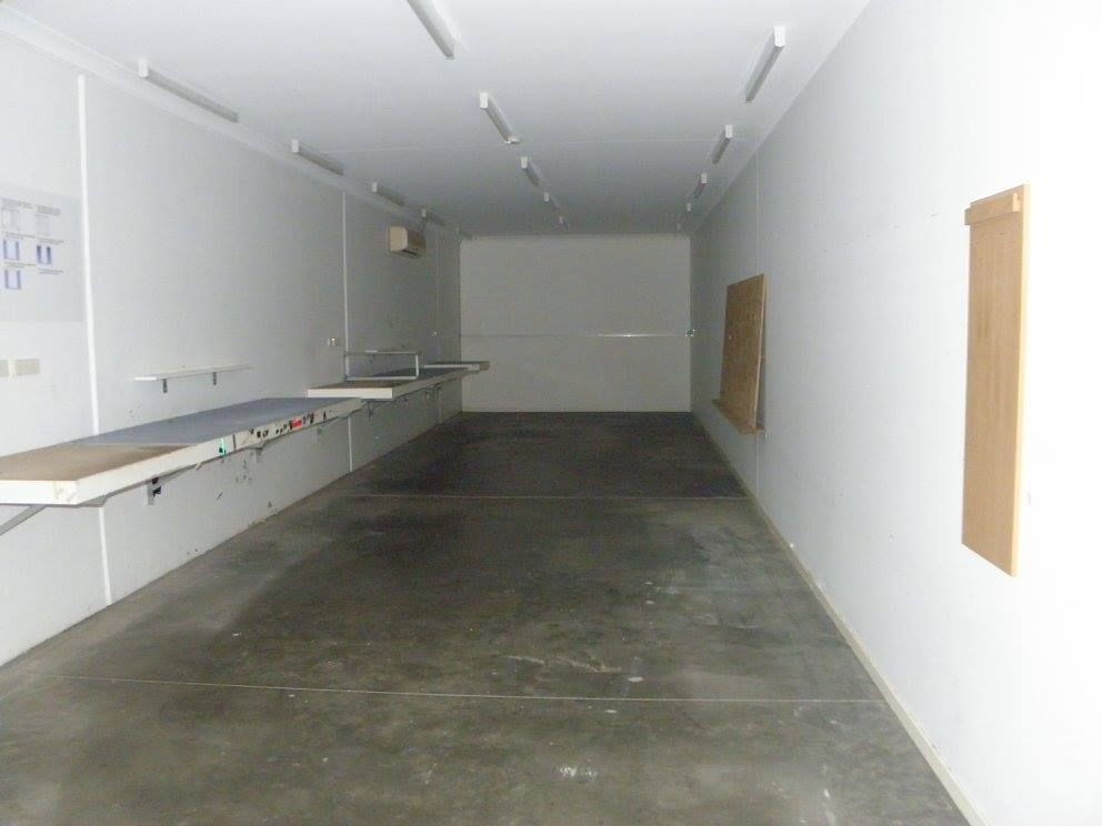 An Empty Room With a Concrete Floor and White Walls — North Coast Storage in North Boambee Valley, NSW