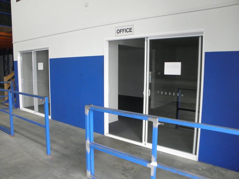 A Blue and White Building With a Sign That Says Office — North Coast Storage in North Boambee Valley, NSW