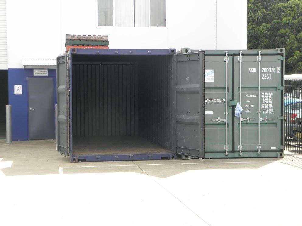 Two Shipping Containers Are Parked Next to Each Other in a Parking Lot — North Coast Storage in North Boambee Valley, NSW