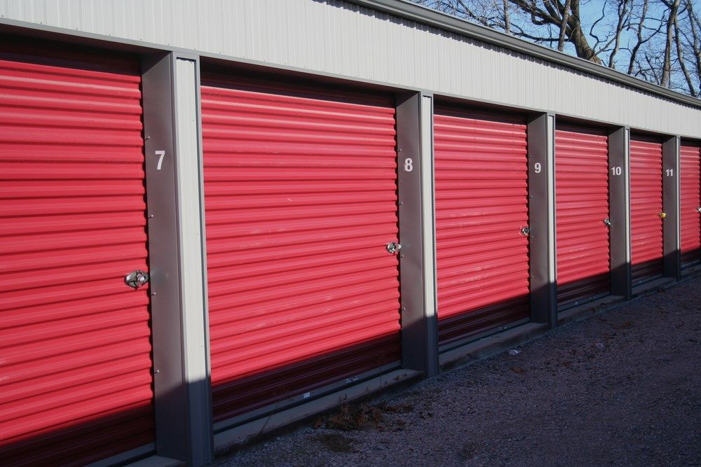 A Row of Red Garage Doors With the Number 7 on Them — North Coast Storage in North Boambee Valley, NSW