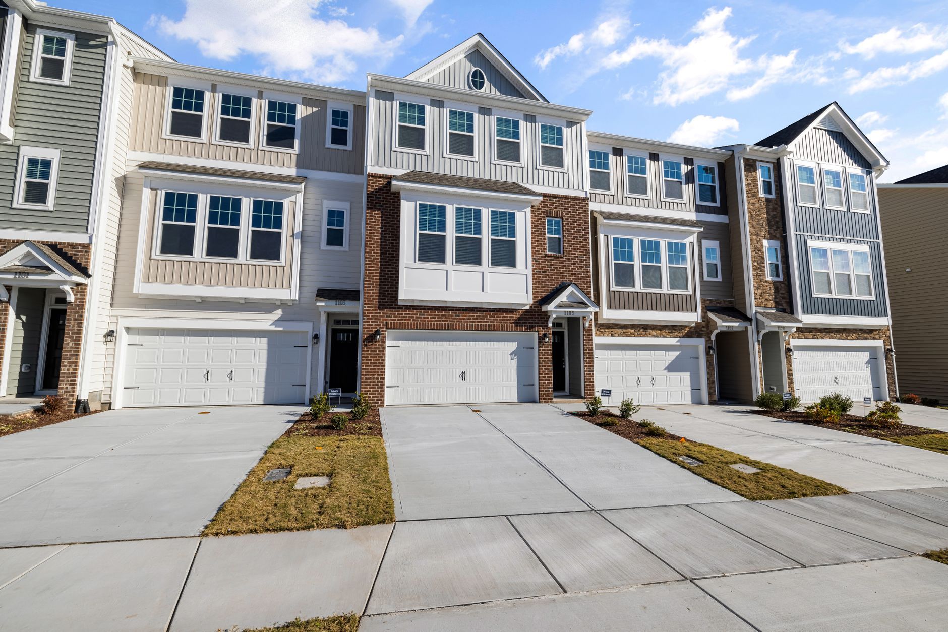 Row of new townhomes with attached garages