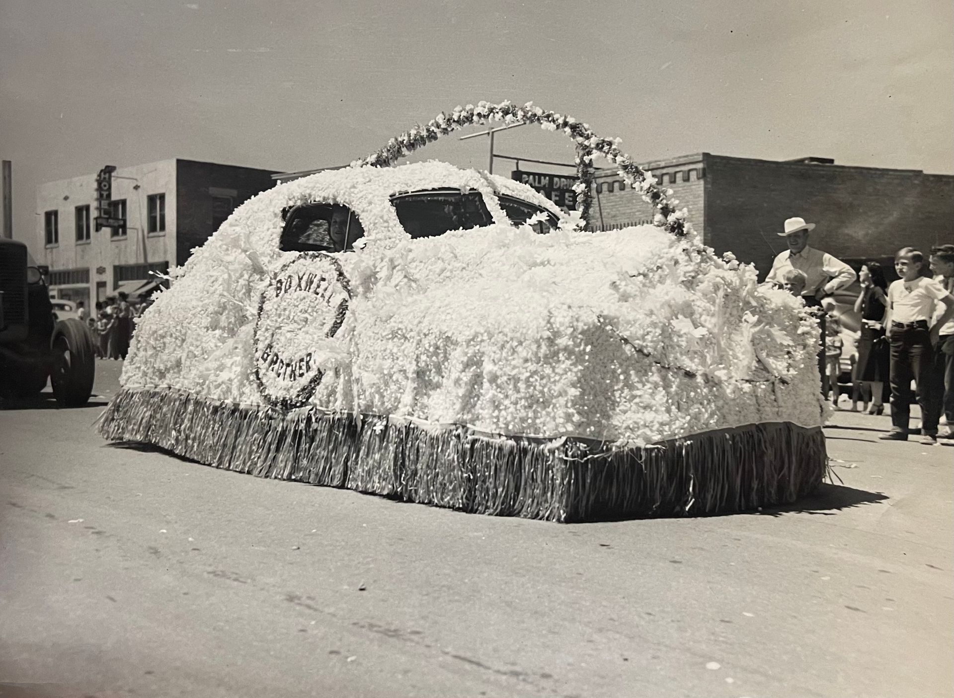 Historical photo of the Boxwell Brothers participating in a commmunity event