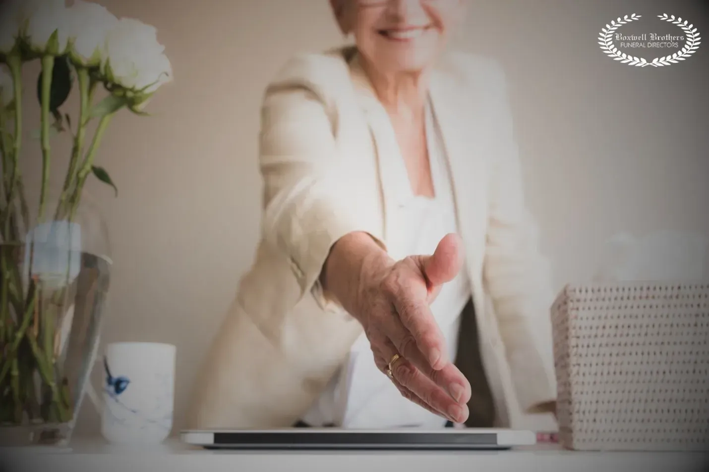 shake hands with the funeral staff
