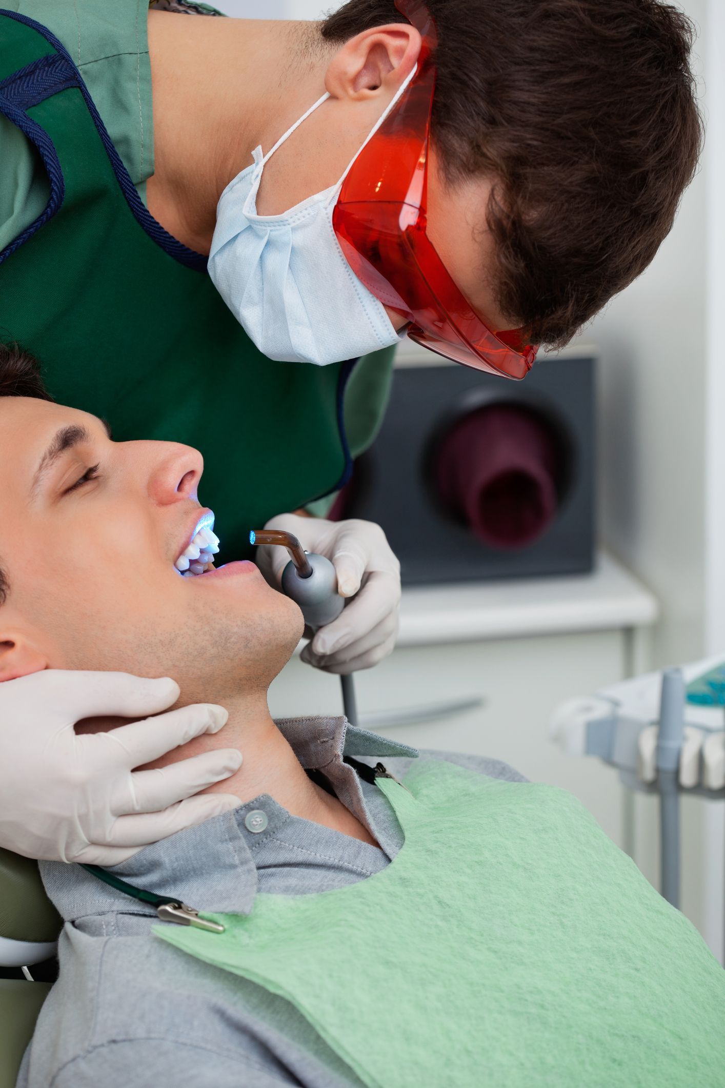 Dentist from Andover Family Dentistry working on tooth a Dental Whitening in Ramsey Mn