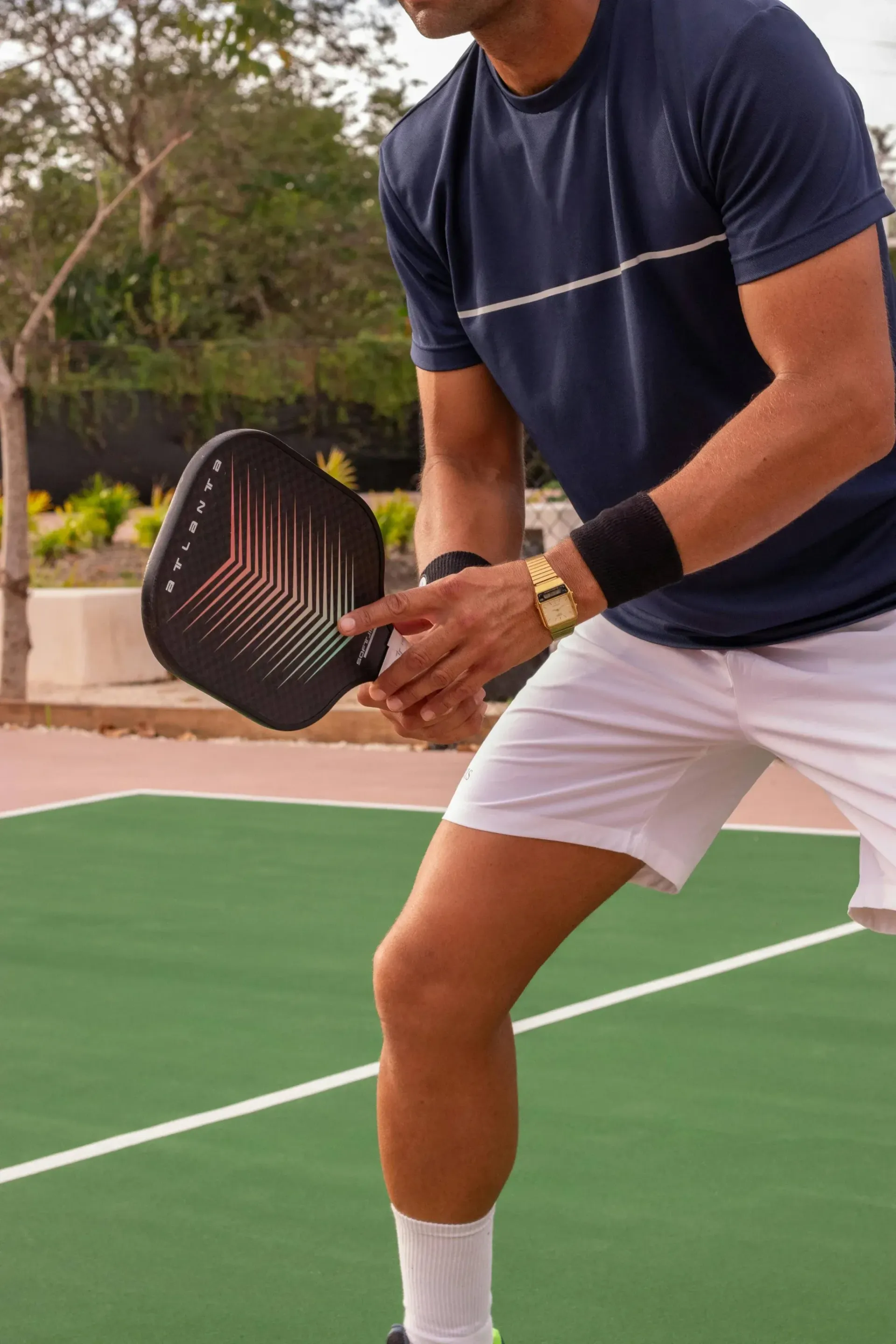 Man playing pickleball.