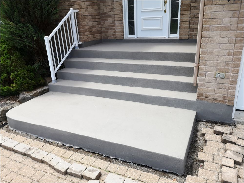 Gray Concrete Stairs Lead Up to a Front Door, With a Railing on the Left — Atherton Tableland Concreting in Yungaburra, QLD