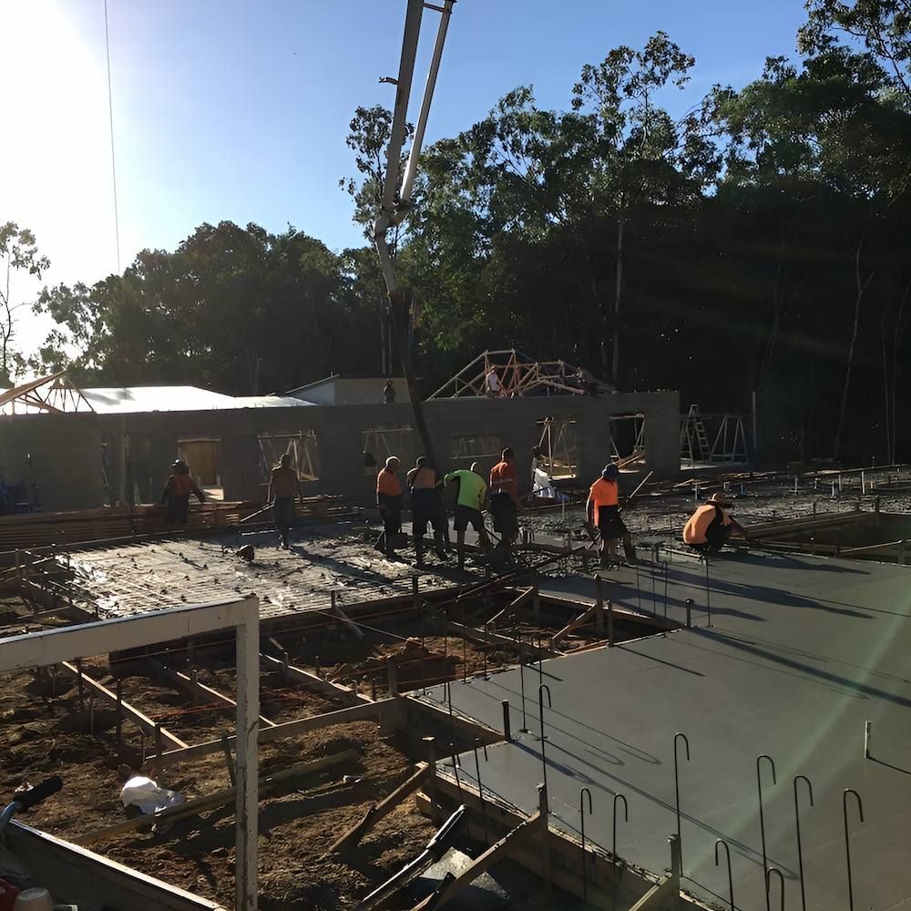 A Group of People Are Working on a Construction Site — Atherton Tableland Concreting in Atherton, QLD