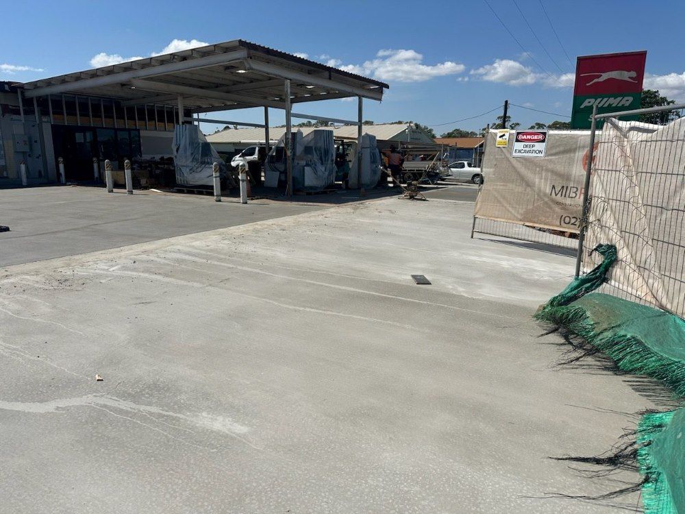 A Gas Station With a Sign That Says Puma on It — Atherton Tableland Concreting in Yungaburra, QLD