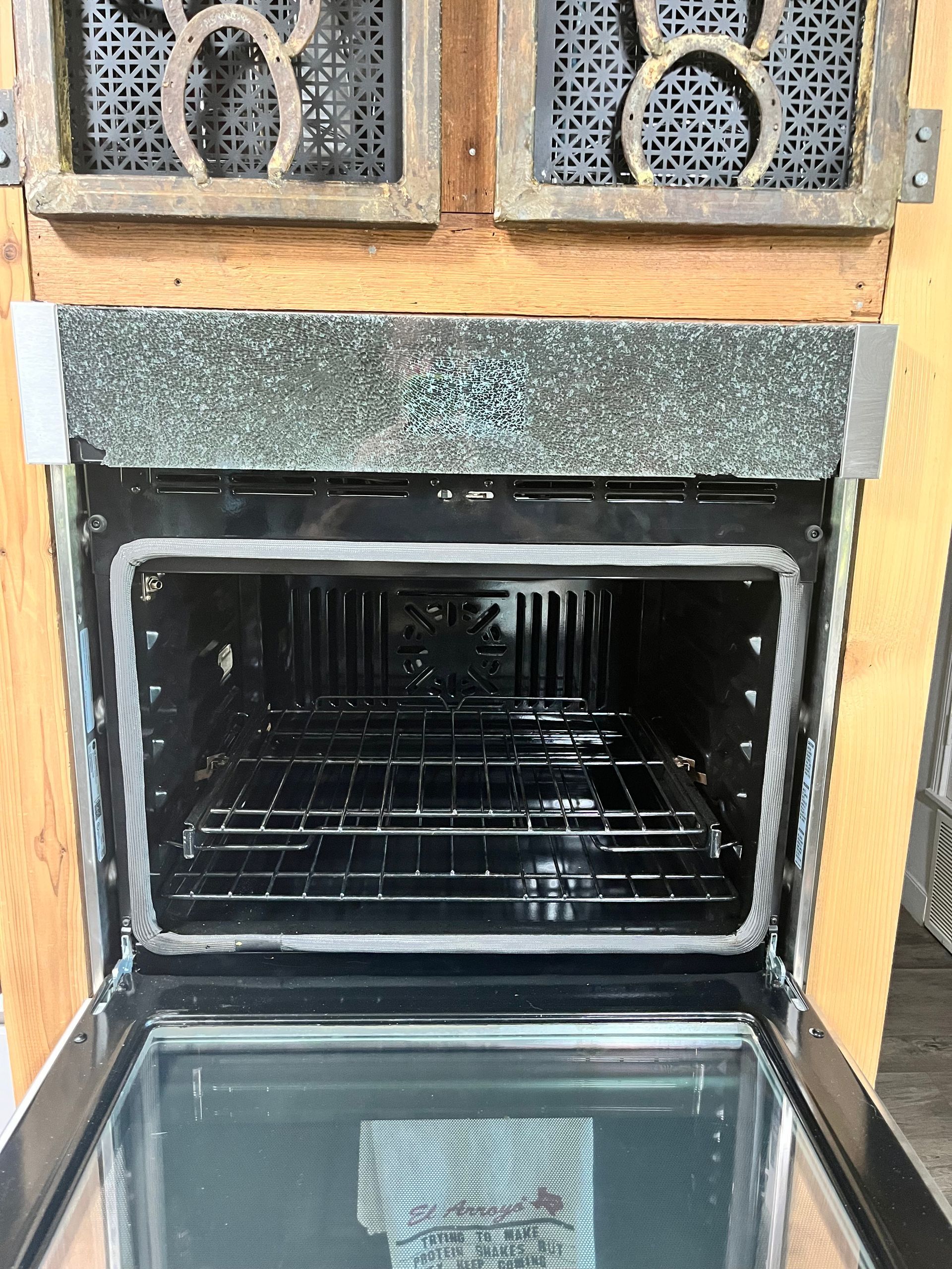 The inside of an oven with the door open.