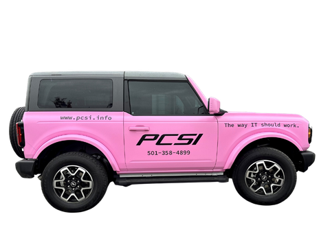 A pink ford bronco is sitting on a white background.