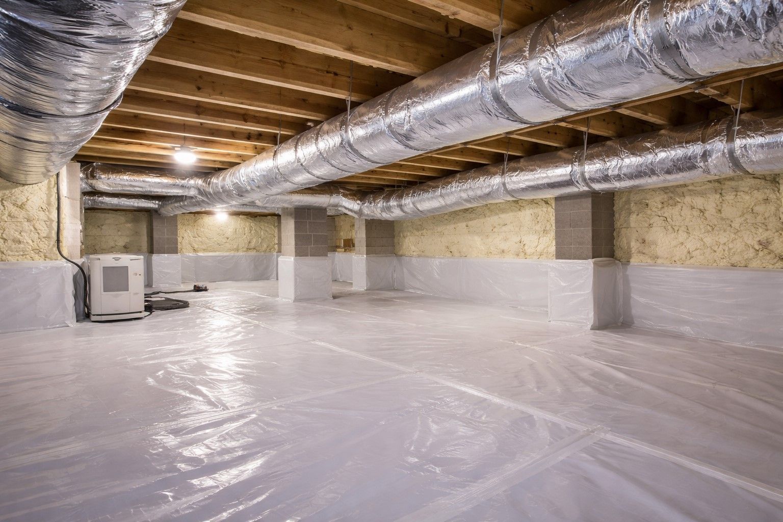 Uninsulated subfloor permitting temperature transfer between living space and crawl space.