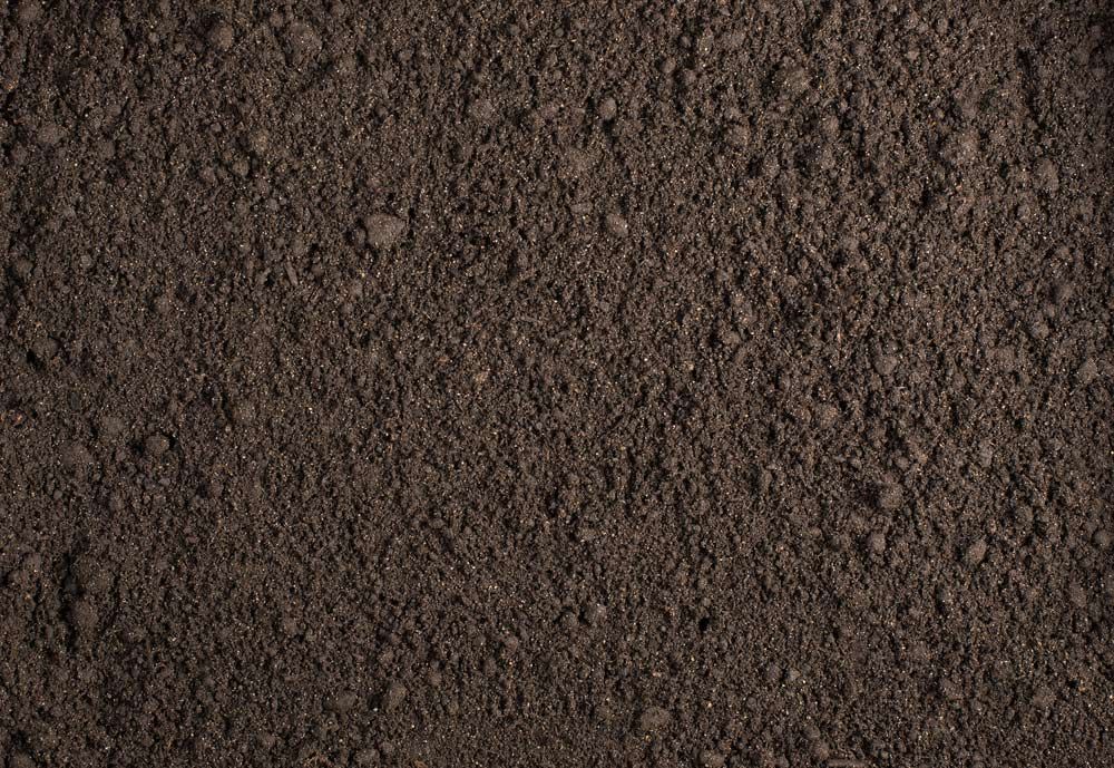 A Close Up of a Pile of Brown Soil — Dubbo Soils & Landscaping Supplies in Dubbo, NSW