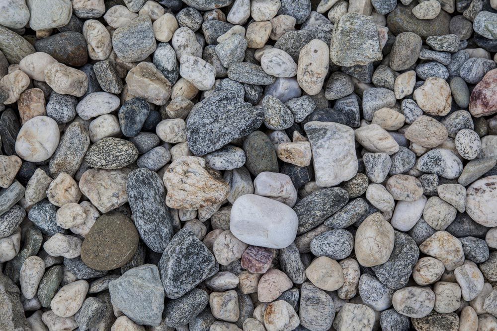 Stones and Gravel Mixed Together — Dubbo Soils & Landscaping Supplies in Dubbo, NSW