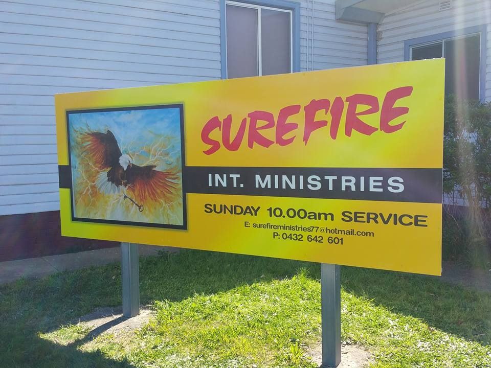 A Yellow and Red Sign for Surefire Int Ministries — Mountain City Signs In West Tamworth, NSW