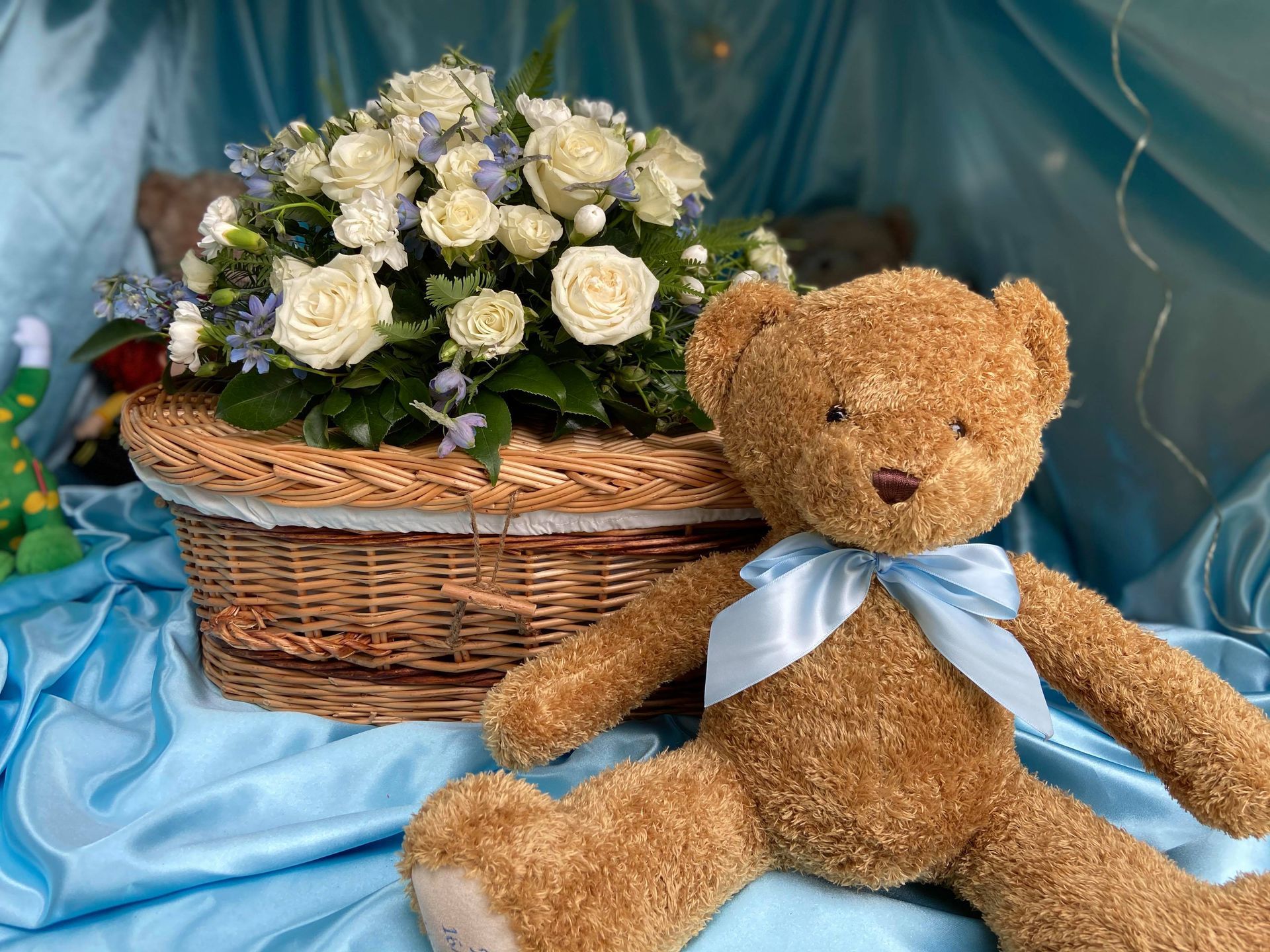 A teddy bear wearing a shirt that says i love you - Funeral Services in Upper Coomera, QLD