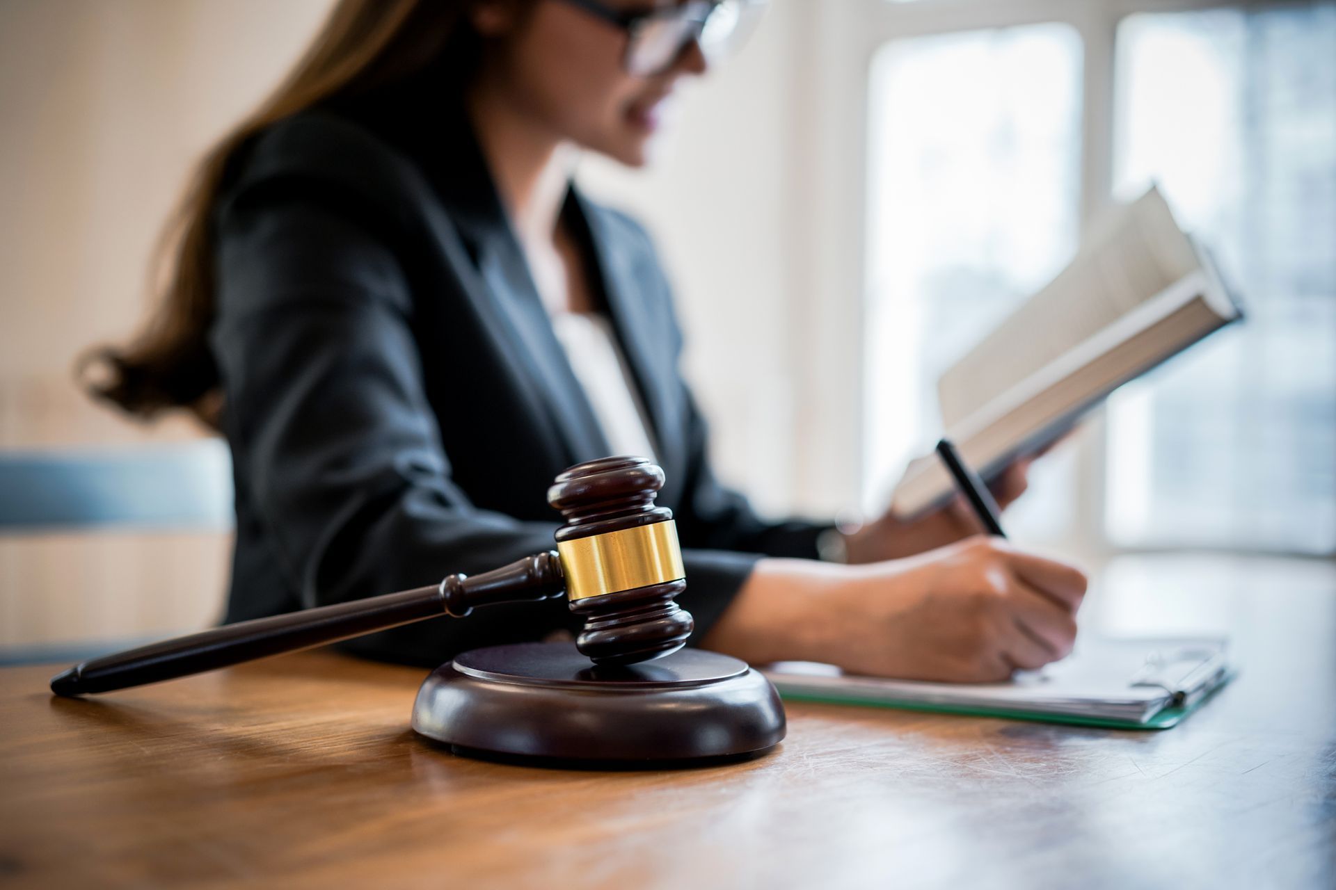 Lawyer Looking At Law Book — McComb, MS — O. Reneé Wells Peavy