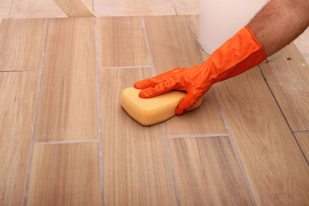 Grouting Tiles Floor — Big Red Carpet & Property Maintenance In Collinsville , QLD Grouting Tiles Floor — Big Red Carpet & Property Maintenance In Collinsville, QLD