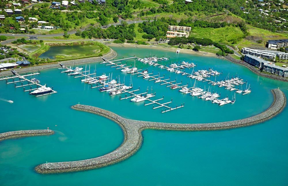 Aerial View of Airlie Beach Landscape — Big Red Carpet & Property Maintenance In Airlie Beach, QLD Aerial View of Airlie Beach Landscape — Big Red Carpet & Property Maintenance In Airlie Beach, QLD