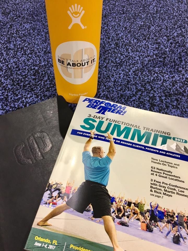Fitness magazine on a table beside a yellow stand, with a person jumping on the cover.