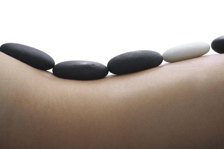 hot basalt stones on back