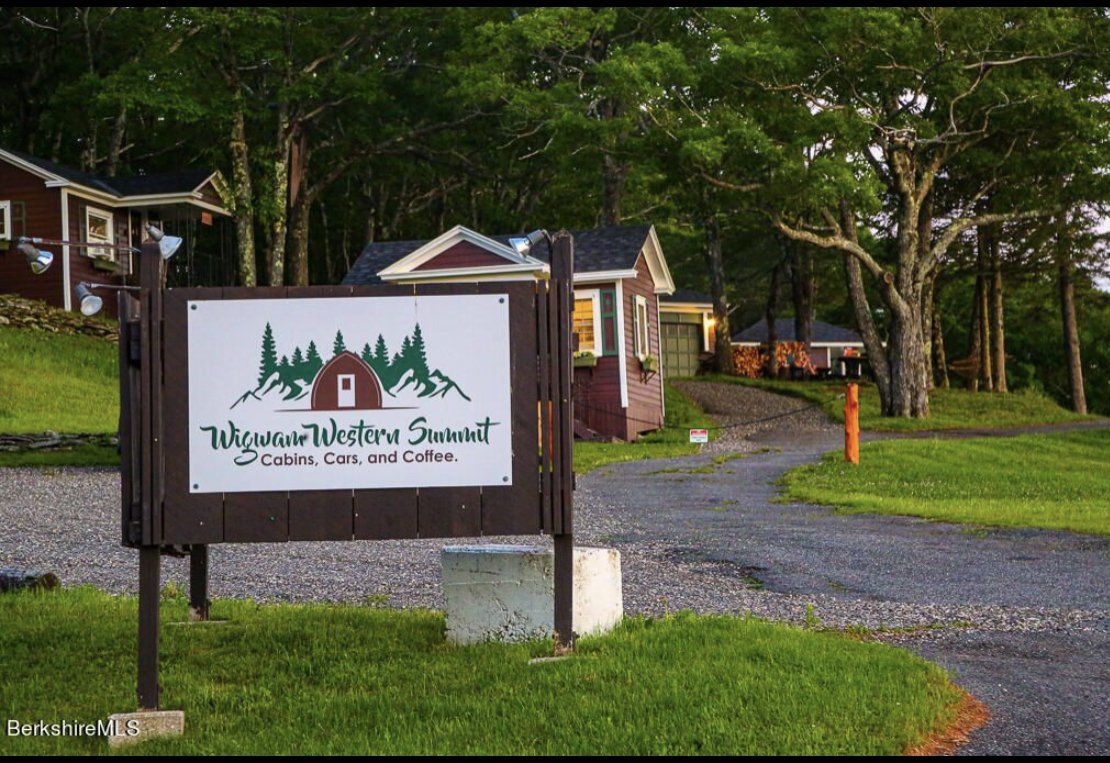 A wooden sign for 