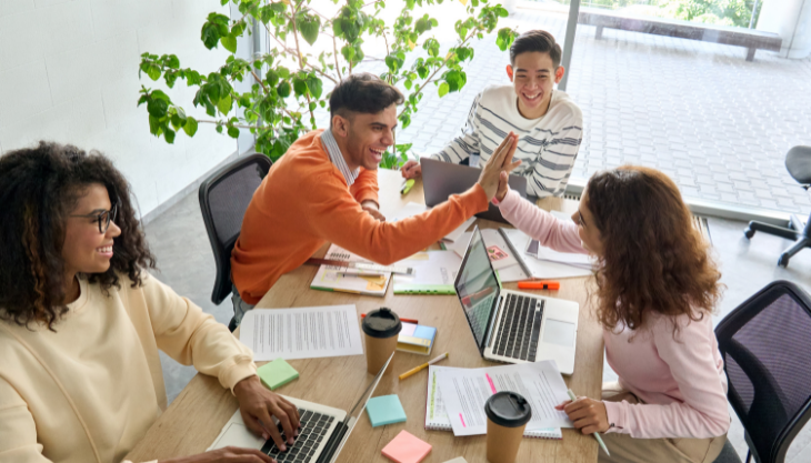 Employees embody their company's culture as they achieve and celebrate work victories