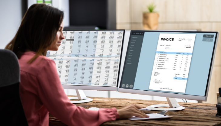 Experienced accounting expert works on their computer and performs efficient, quality bookkeeping from home.