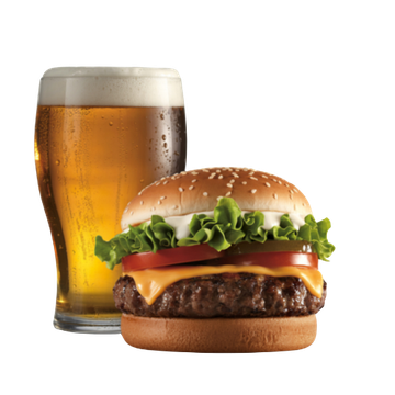 A glass of amber beer beside a cheeseburger with lettuce and tomato on a white background