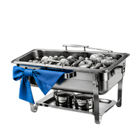Stainless steel chafing dish with ice, tied with a blue ribbon, on a white background
